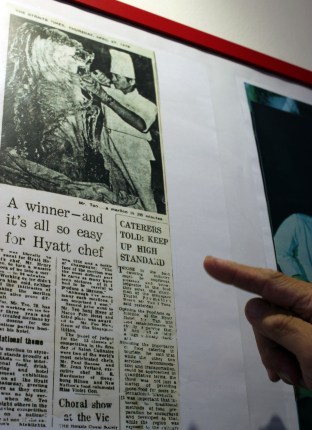 Now 63, Henry points out the merlion he carved in 28 minutes at the Hyatt competition in 1978.