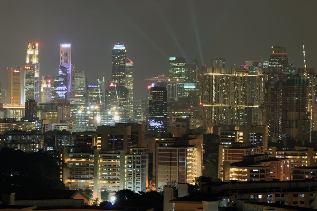 Day & Night over Central Singapore.