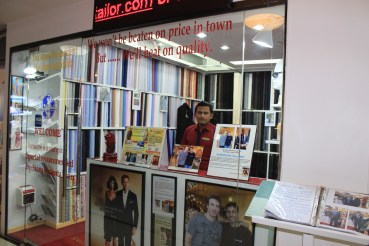 The exterior of Overseas Tailor proudly displays an enlarged photo of Joe Sakic in Bangkok.