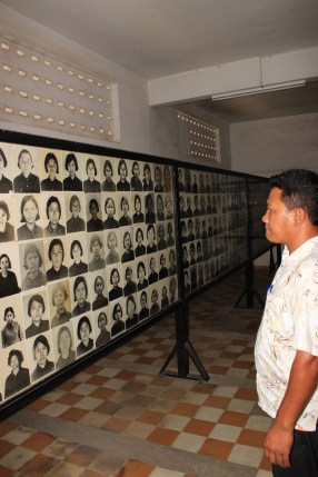 Run looks on at the thousands of victims imprisoned & tortured at the S-21 prison near the Killing Fields.