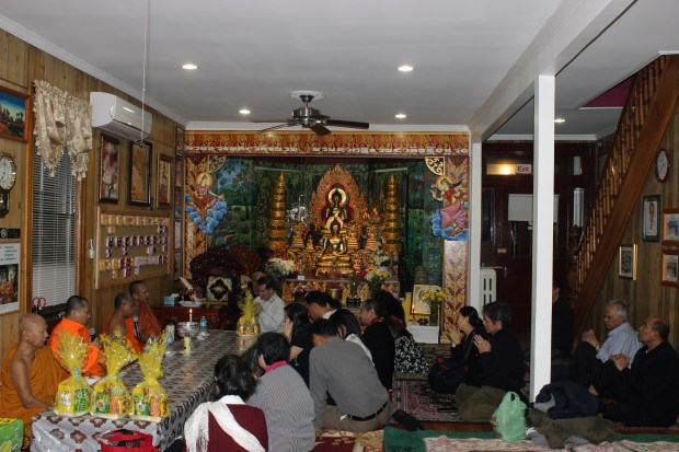 Wat Jotanaram's followers gather for worship on a Saturday evening. 